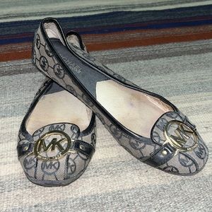 Michael Kors Black and Gold Logo Flats